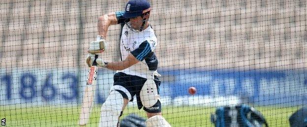 Alastair Cook warms up in the nets