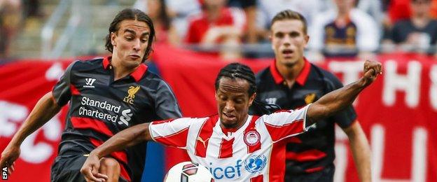 Lazar Markovic (left) made his first appearance for Liverpool in the game against Olympiakos