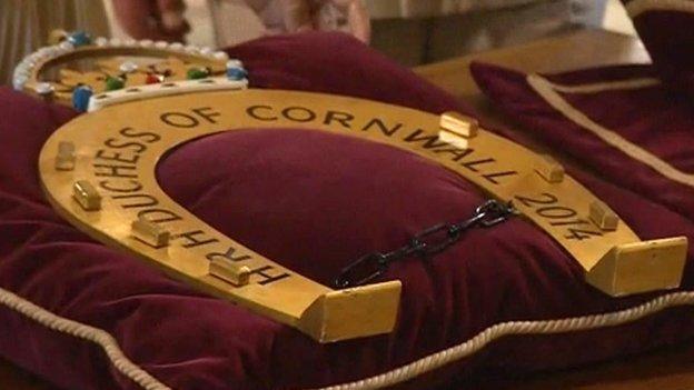 The Duchess of Cornwall presented a decorative horseshoe to mark her first official visit to Oakham, Rutland