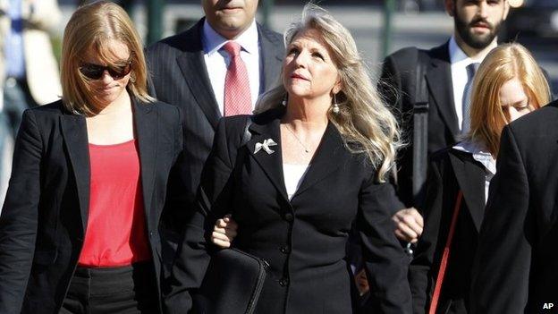 Former Virginia first lady Maureen McDonnell, center, is flanked by daughters Rachel McDonnell, left, and Cailin Young, right, shown arriving at the federal courthouse in Richmond, Virginia 28 July 2014