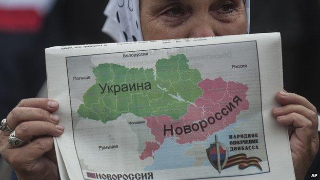 Rebel sympathiser with map showing old Novorossiya territory