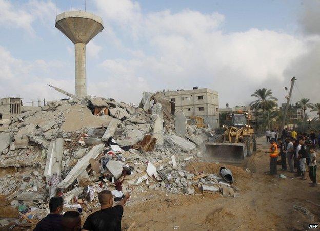 Rescue workers in Rafah, Gaza Strip, 29 July