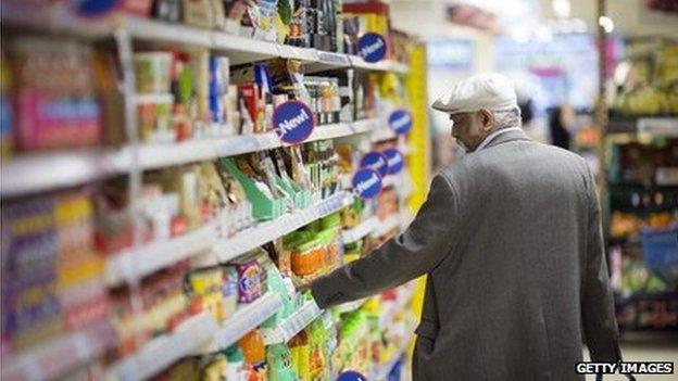 A man browsing shelves in Tesco