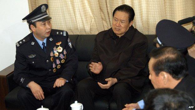 Mr Zhou with police officers, 2006