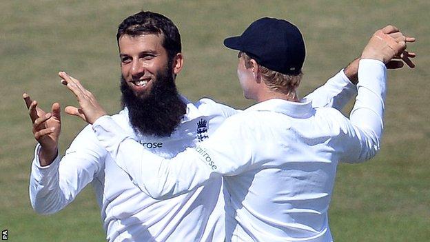 England's Moeen Ali celebrates a wicket