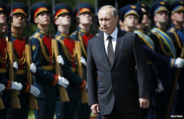 Russian President Vladimir Putin attends a ceremony to commemorate the anniversary of the beginning of the Great Patriotic War against Nazi Germany in 1941 in Moscow - 22 June 2014