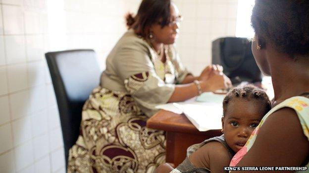 Patients seeing a physician at the Connaught Hospital in Freetown