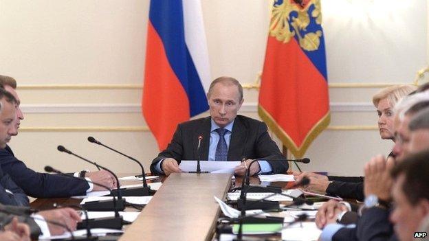 Russian President Vladimir Putin chairs a Cabinet meeting in Moscow - 30 July 2014