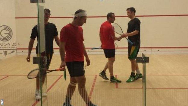 Nick Taylor and Scott Gautier (red shirts) after their loss to Jamaica