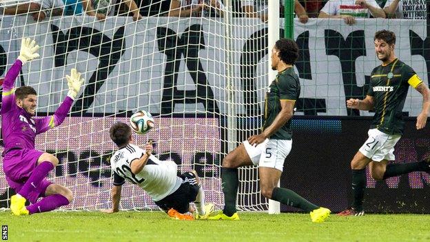 Legia Warsaw's Miroslav Radovic scores against Celtic