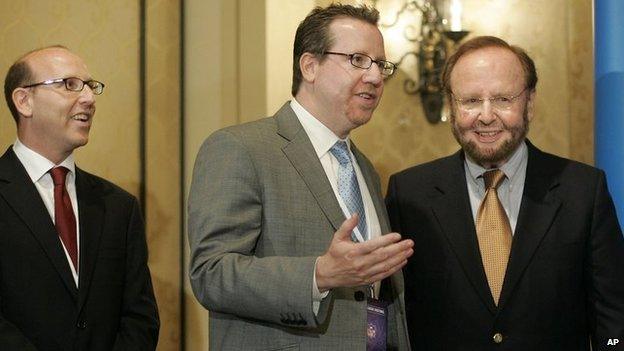 Joel Glazer, left, Bryan Glazer, center, and Tampa Bay Buccaneers team owner and president Malcolm Glazer