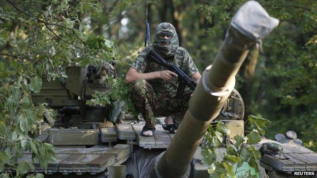 Pro-Russian rebel atop T-64 tank