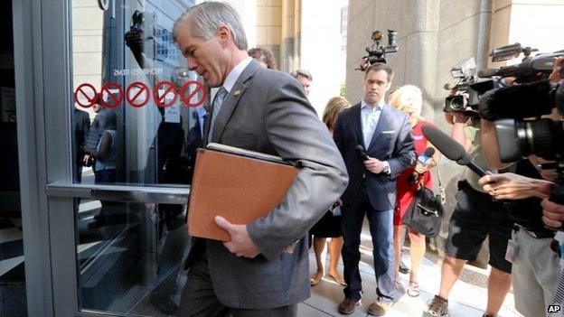 Former Virginia Gov. Bob McDonnell heads into the Federal Courthouse for his and his wife Maureen's corruption trial, in Richmond, Virginia 31 July 2014