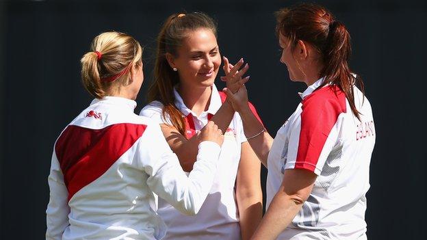 Ellen Falkner, Sophie Tolchard and Sian Gordon celebrate