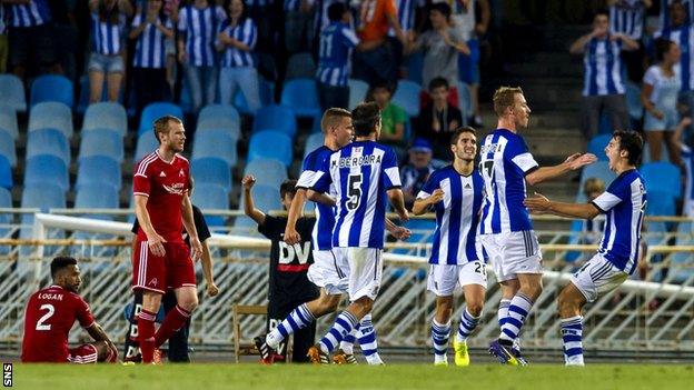 Real Sociedad's David Zurutuza (2nd right) celebrates after putting his side ahead.