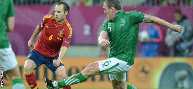 Richard Dunne and Andres Iniesta