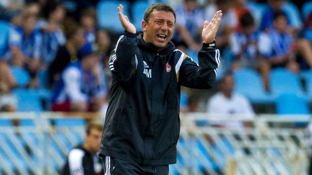 Aberdeen manager Derek McInnes barks orders from the touchline against Real Sociedad