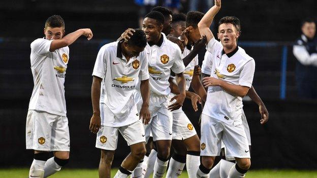 Cameron Borthwick-Jackson celebrates after scoring Manchester United's second goal