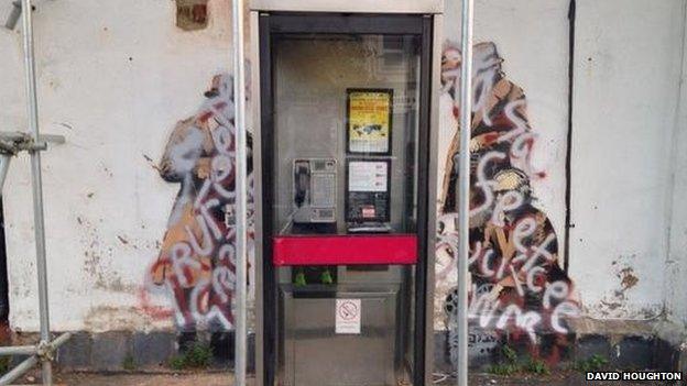 Defaced Banksy artwork