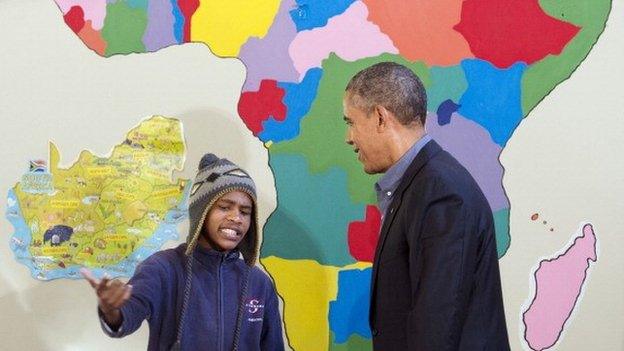 A young South African raps for US President Barack Obama during a tour of the Desmond Tutu HIV Foundation Youth Centre in Cape Town, South Africa - 30 June 2013