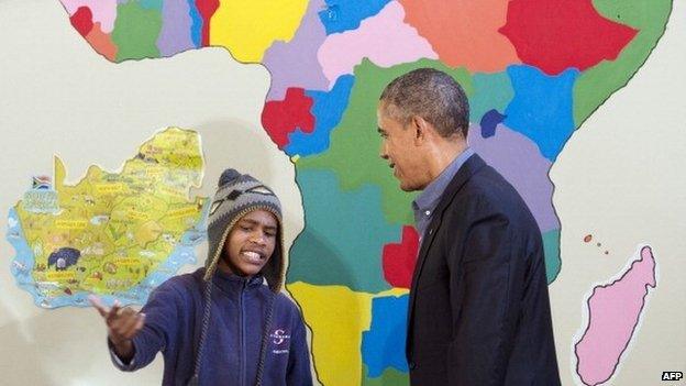 A young South African raps for US President Barack Obama during a tour of the Desmond Tutu HIV Foundation Youth Centre in Cape Town, South Africa - 30 June 2013