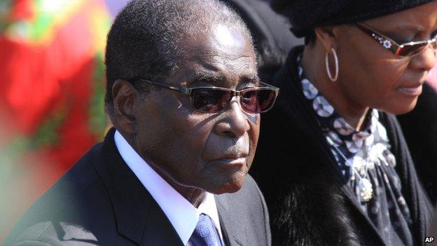 Zimbabwean President Robert Mugabe and his wife Grace pictured at an event in Harare in June, 2014