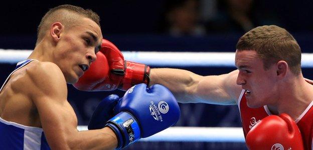 Sean McGlinchy [right] won a light-heavyweight boxing bronze