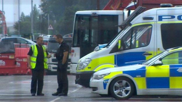 Police vehicles at the scene on Friday evening