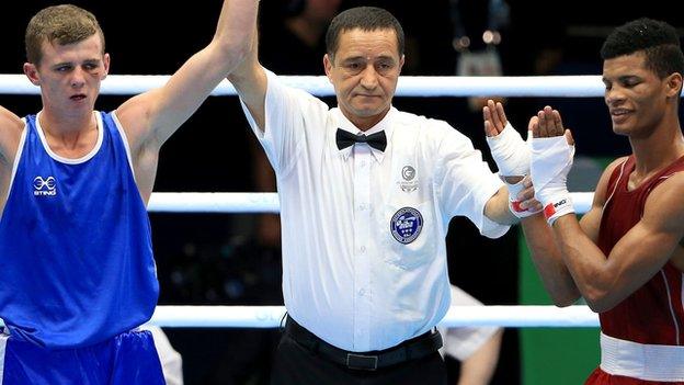 Northern Ireland's Joe Fitzpatrick celebrates his win over Trinidad and Tobago's Michael Alexander