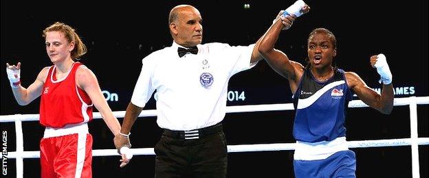 Nicola Adams (right) of England celebrates winning the gold medal against Michaela Walsh of Northern Ireland