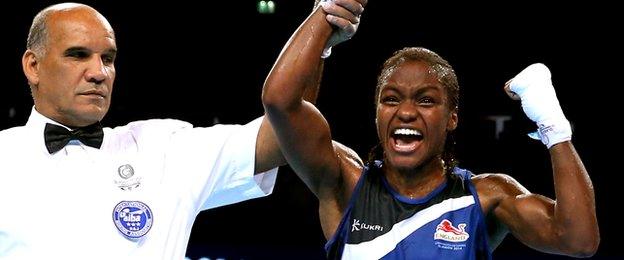 Nicola Adams celebrates winning gold