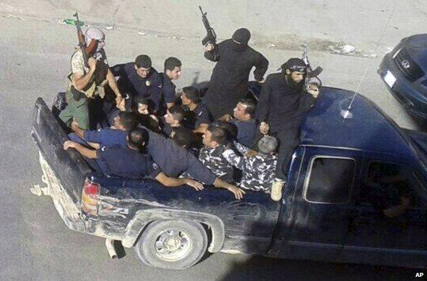 Gunmen drive off with captives in the Lebanese border town of Arsal, 2 August