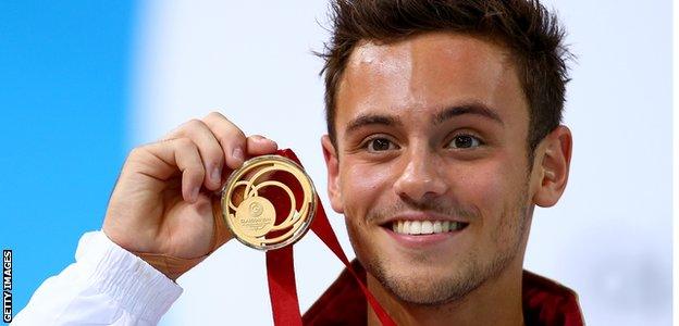 Tom Daley poses with his Commonwealth 10m platform diving gold