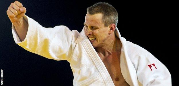 Euan Burton delivered one of six judo golds for the host nation