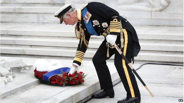 Prince Charles lays a wreath