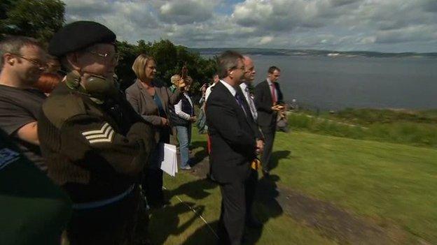 Both unionist and nationalist politicians attended the gun salute over Belfast Lough