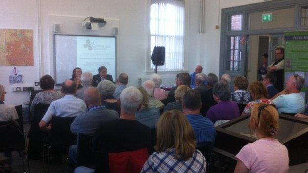 Audience at the opening of the exhibition