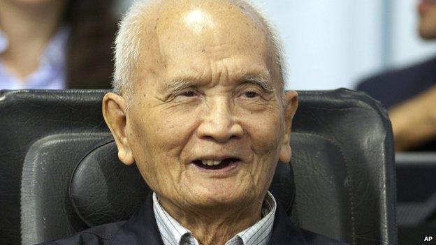 In this photo released by the Extraordinary Chambers in the Courts of Cambodia, Nuon Chea smiles before his final statements at the tribunal in Phnom Penh, Cambodia on 31 Oct 2013