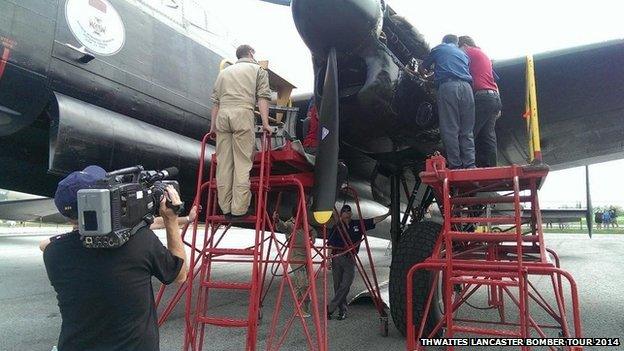 Engineers working on Lancaster bomber