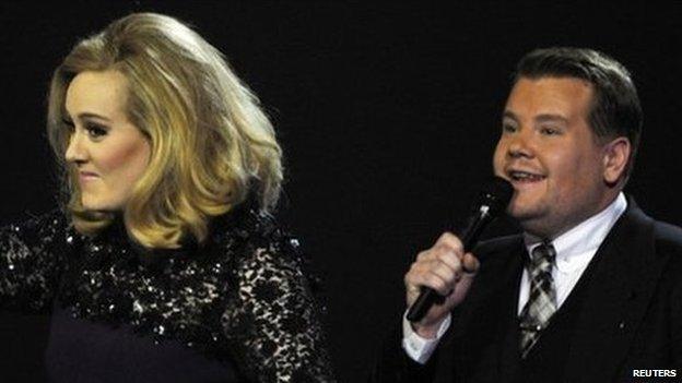 Adele with host James Corden at the Brit Awards