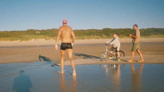 Adam Walker arriving in France after swimming the English Channel