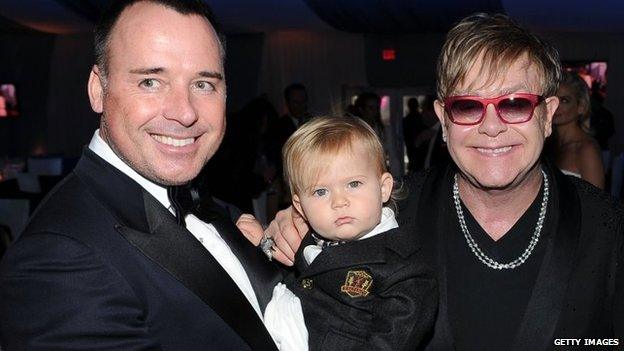 From left: David Furnish, son Zachary and Sir Elton John attend the 20th Annual Elton John AIDS Foundation Academy Awards Viewing Party at The City of West Hollywood Park in Beverly Hills, California, US,26 February 2012