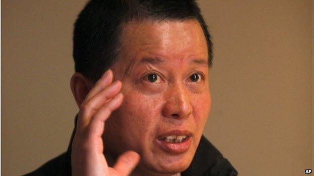 In this 7 April 2010 file photo, Gao Zhisheng, a human rights lawyer, gestures during an interview at a tea house in Beijing, China.