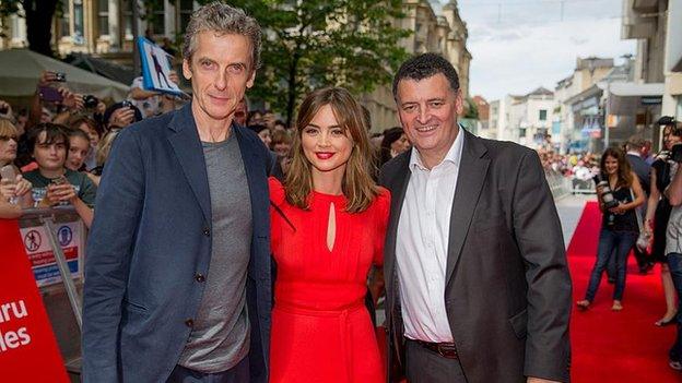 Peter Capaldi, Jenna Coleman and the show's lead writer Steven Moffat on the red carpet