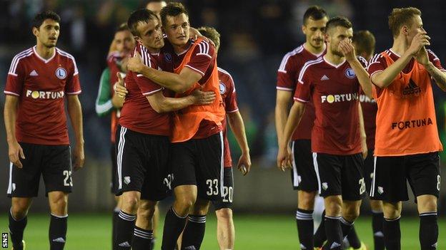 Legia Warsaw players celebrate after their 2-0 win over Celtic at Murrayfield