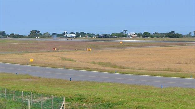 Plane landing at Guernsey Airport