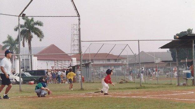 Little league field with palm trees