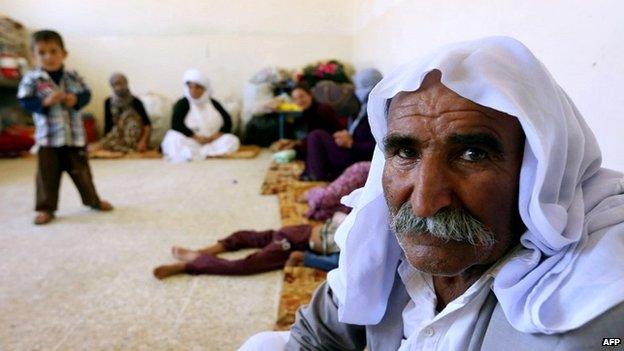 An elderly Yazidi man who fled the violence in the northern Iraqi town of Sinjar, at a shelter in the autonomous Kurdistan region - 5 August 2014