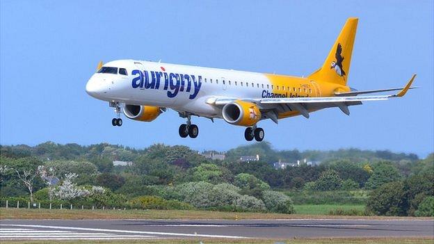 Aurigny Embraer 195 jet coming in to land at Guernsey Airport