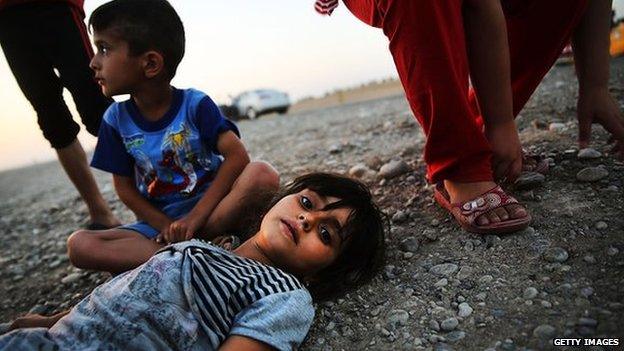 Refugees at a camp in Khazair